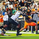 11574836185_10_17_FootballVsMtPleasant_LC-651-Enhanced-NR